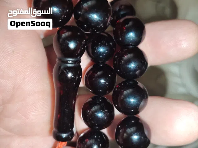 سبه من العنبر او الكهرب الأحمر المميز لله اه وأصحاب الذوق الرفيع مسابح اخرى