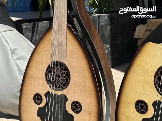 عود حكيم صناعه زرياب سوري زند عياري مع حقيبه جلد وريشه فقط ب 69.99 دينار