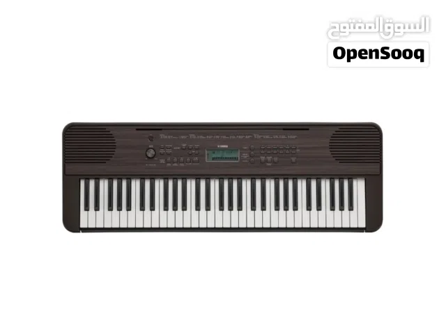 أورج ياماها "مخزّن" مستعمل نظيف مع ستاند  اللون الجوز الداكن  Yamaha PSR-E360