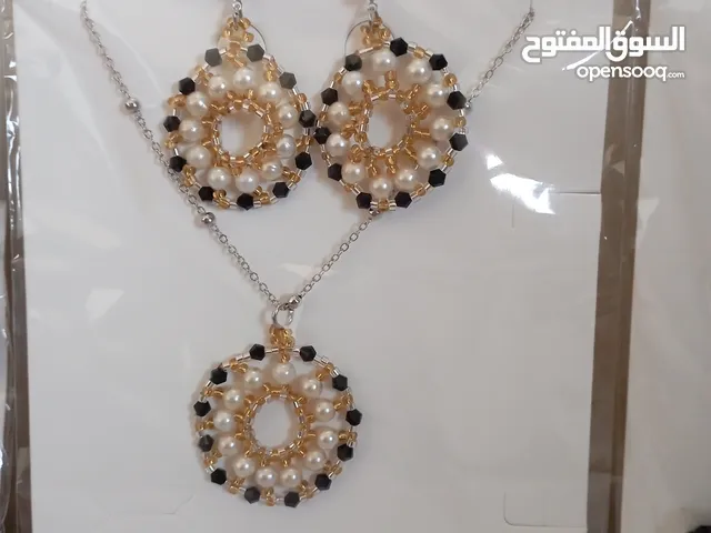 طقوم نسائيه عمل يدوي