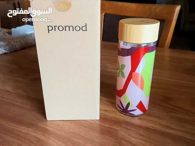 قنينة زجاج ماركة promod مع غطاء خشب محكم الإغلاق 500 ملل تستخدم للماء او العصير