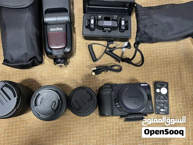 Nikon Z30 و 3 عدسات و فلاش و مايك