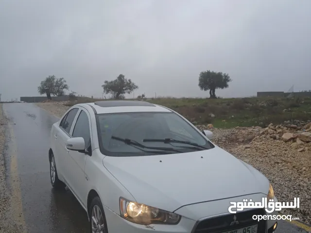 ميتسوبيشي لانسر. 2015 اصل برايفت   رخصة وتامين  ماطور 1600 اتومات  شامل  فتحة