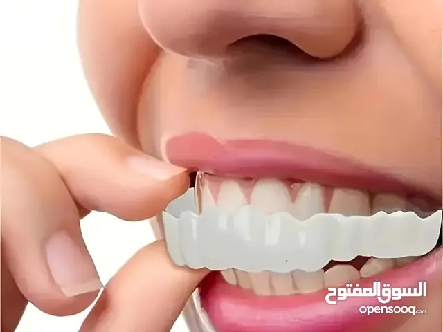 اسنان صناعية عدد اربع فك سفلي وعلوي