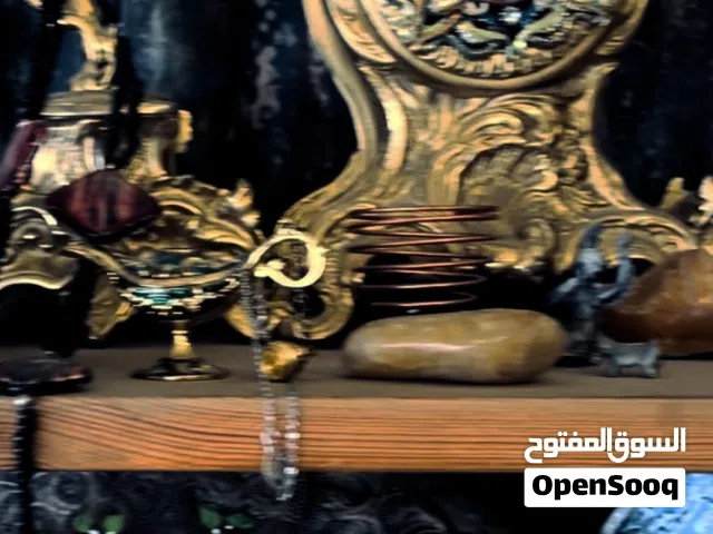 شمعدان مع ساعه عتيق مطلي ذهب
