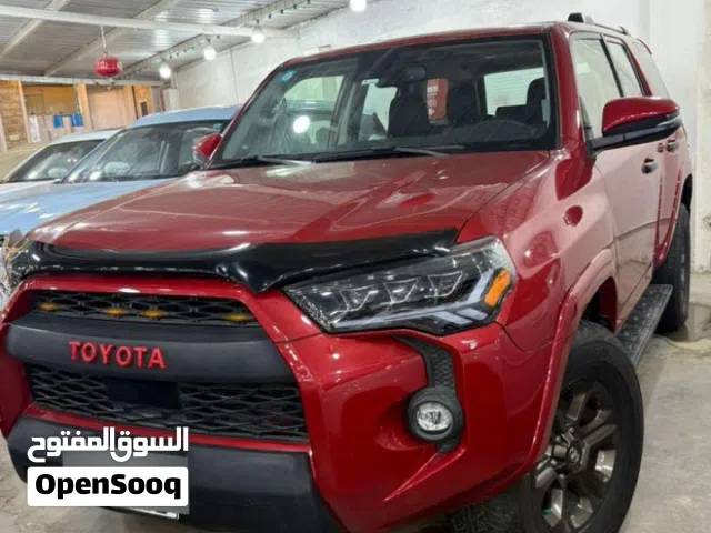 تويوتا فور رانر امريكي لون احمر موديل 2022 ماشي 70,000
