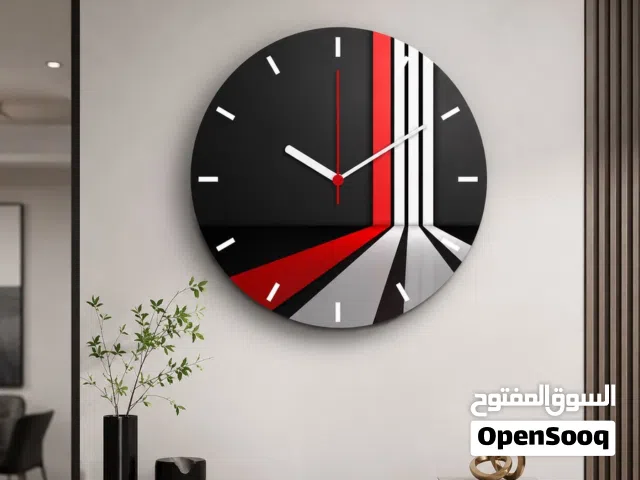 ساعة حائط مودرن دائرية بتصميم هندسي عصري – أسود وأحمر