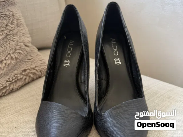Black Leather High Heels. Brand: ALDO