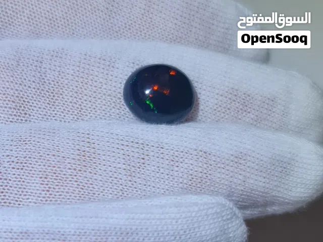 حجر اوبال ناري اثيوبي اسود للبيع