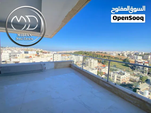 شقة جديدة دوبلكس طابق أخير مع روف للبيع خلدا 185م مع تراسات امكانية الأقساط