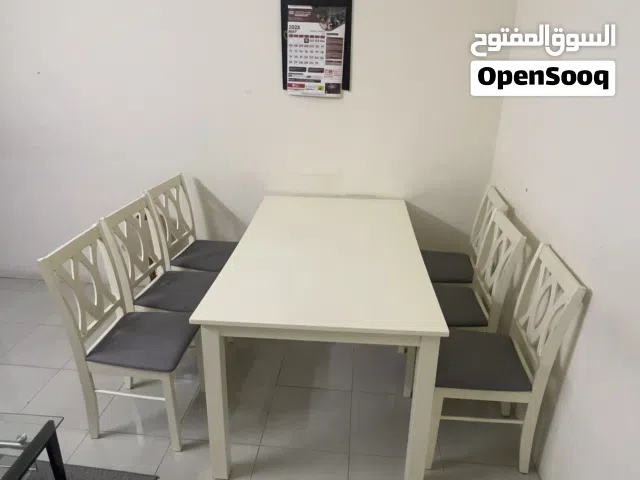 Solid Wood Dining Table with 6 Chairs.