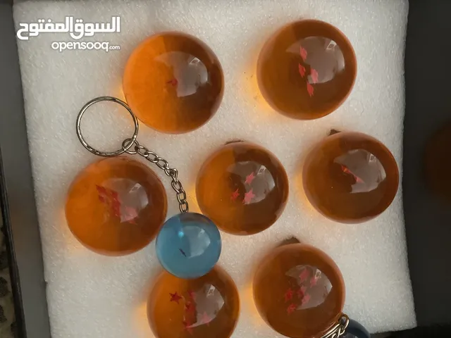 كرات دراغون بول اصلية غير قابلة للكسر مع لون مميز لامع مع ميداليتان كرات صغيرة ذات لون ازرق نادر