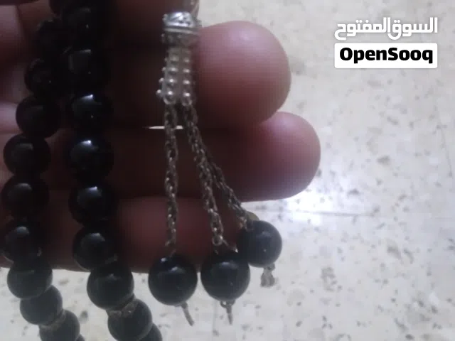 مسبحة الزبرجد احجار كريمه وزن 56 غرام ومسبحه لولي وزن 35غرام