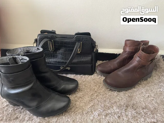 جزمة شتاء وشنتة ( حقيبة)