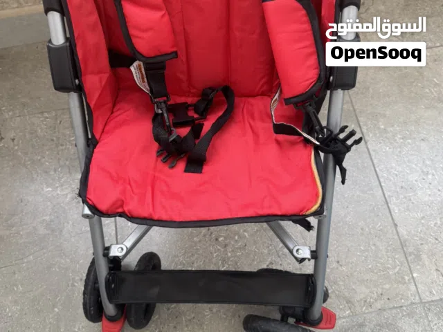 عرباية أطفال (Umbrella Stroller) خفيفة وعملية لون أحمر مميز