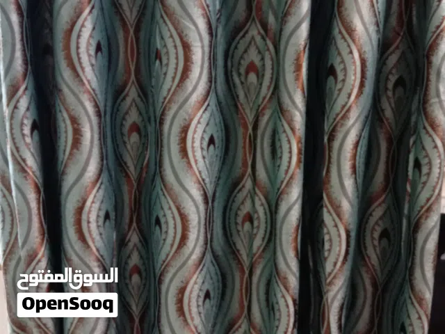 برداية ستارة لون تركواز وبني فاخرة