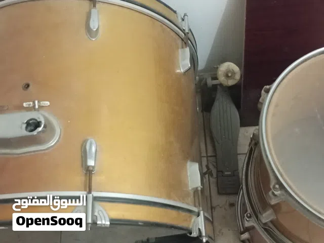 Bass drum, 2 tom drums, and pedal included