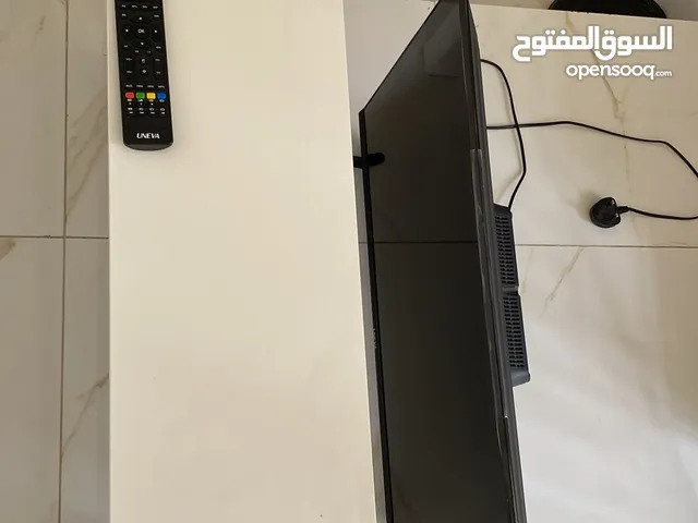 شاشه UNEVA مافيه شي جديده مع طاوله من ايكيا كل شي جديد مع ريموت