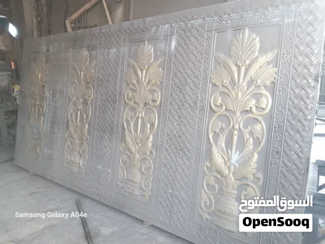 باب 4 متر و5سم العرض بارتفاع 3 متر حديد