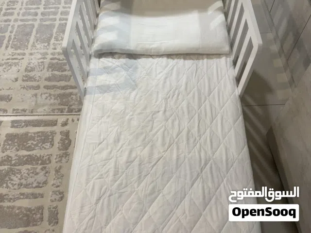 Jessie’s White Toddler Bed