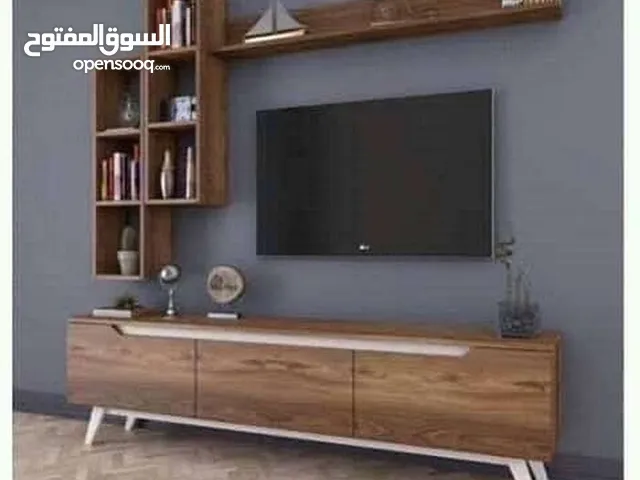 أضف لمسة جمالية رائعة من طاولات الشاشة وبديل الخشب والرخام والشيبورد والدريسنج روم وأعمال الديكور