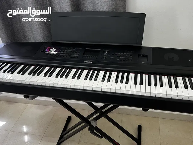 Piano digital DGX-670B yamaha with stand from Thomsun بيانو ياماها