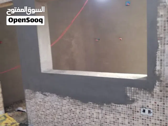 ملعقه ومباني مقاولات
