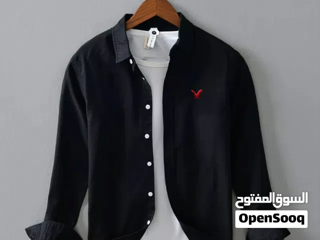قميص أمريكي ايجل  - خامة اكسفورد قطن  - تطريز بأعالي الجوده  - الالوان: ابيض - اسود - لبني - رمادي -