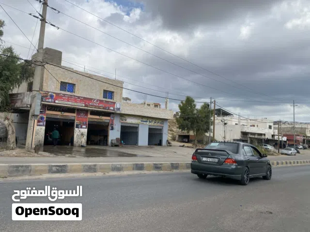 للبيع مخازن تجارية على الشارع الرئيسي