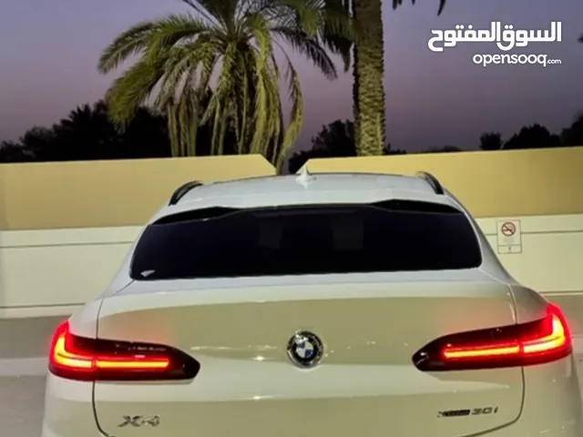 White BMW x4 drive 30i 2021 للبيع