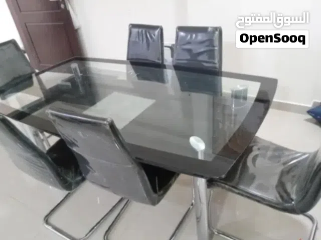 Glass table with chairs