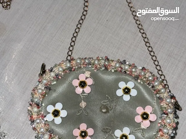 شنطة كتف لون زيتي