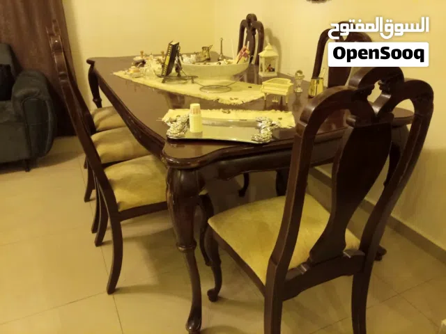 طاولة سفرة و طقم كنب 7 مقاعد