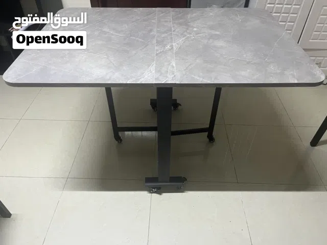 Foldable table on tires barely new. Bought last month. Cash payment only