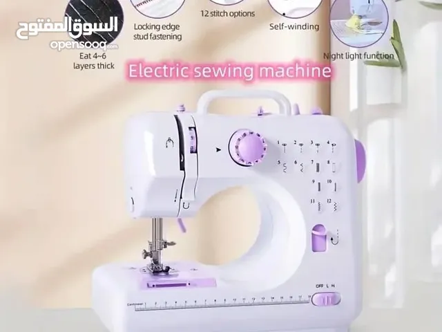 *ماكينة خياطة سفري الحجم الكبير