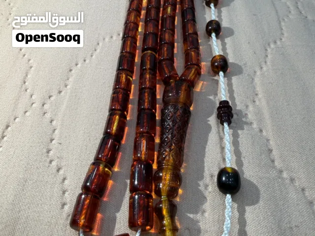 بكلايت لون عسلي مبرقع 8/12 مللي 60 خرزه 80  درهم
