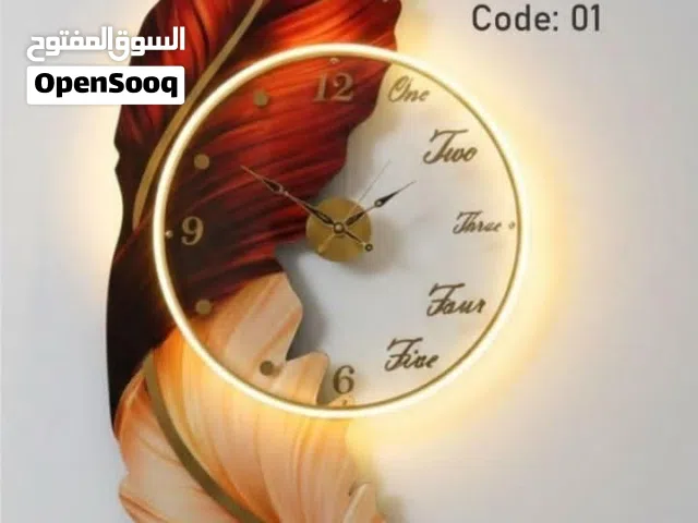 ساعة جدارية مودرن بإضاءة نيون مميزة