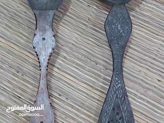 ملاعق لوز مصنوعة من النحاس