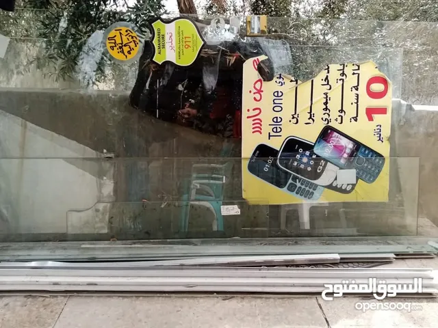 باب زجاج محل المنيوم
