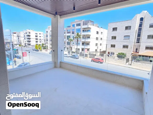 شقه طابق اول للبيع بموقع مميز ضاحيه النخيل طريق المطار مساحه 210م