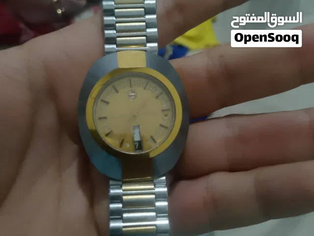 ساعه رادوا الاصليه دايا استار بلونيين ذهبي وفضي