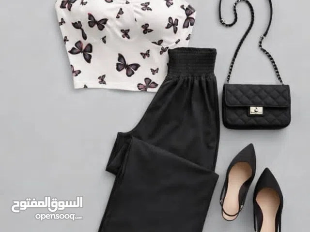 الجديد وصلل اطقم نسائي قطعتين كاجول بلوزه وبنطلون راقي بالاوان جذابه  ومقاسات تناسب جميع الاحجام