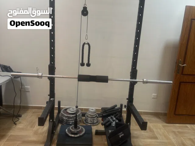 Weights lifting full set with rack and bar plus bench for sale and 155 kg weights.