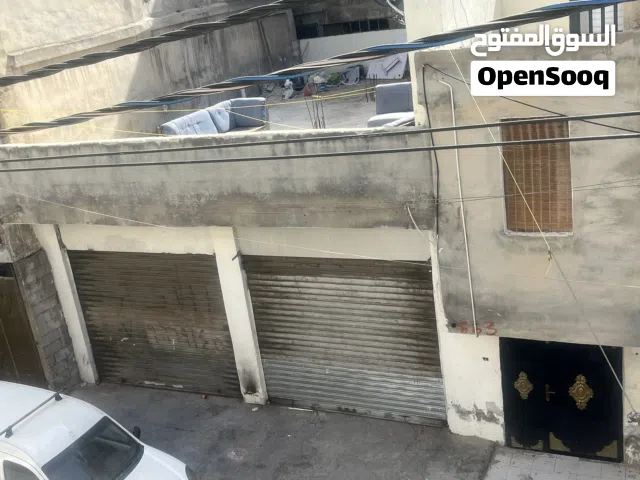 فرصه استثماريه في حي الامير حسن مخيم النصر (((((مخازن للبيع)))))