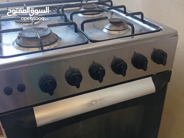 غاز وغساله وخزانه أطفال وتخت وكومودينه
