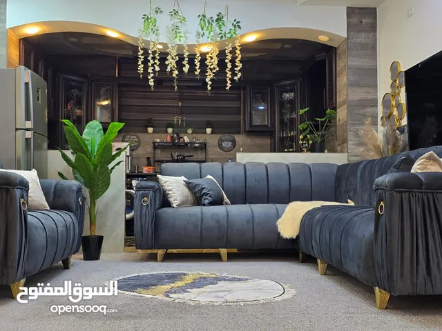 طقم كنب كورنر شبه جديد لون بترولي