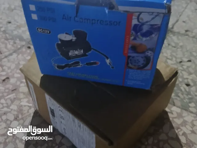 شاحن بطارية سيارة مع منفاخ عجل السيارة جديد مش مستعمل للبيع ......