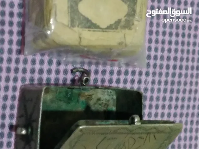 المصحف الشريف بإطار فضي عمره 80 عاماً