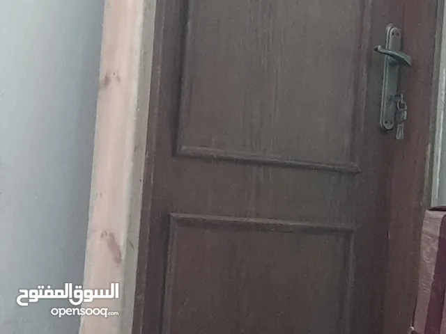 باب خشب مع الحلق 30 دينار