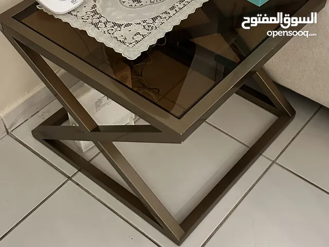 WHITE COUCH, COFFEE TABLE AND SIDE CONSOLE.